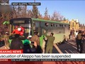 Các tay súng thánh chến lên xe buýt để ra khỏi Aleppo