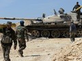 Một chiếc tăng quân đội Syria chuẩn bị cho một cuộc tấn công mới