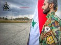 Một lính thủy đánh bộ Syria dưới cờ