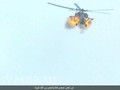 Trực thăng Mi-28 khai hỏa trên sa mạc Palmyra, ảnh từ trang Amaq của IS
