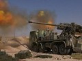 Quân đội Syria sử dụng pháo tự hành bánh hơi 4 cầu M-46 130 mm trên vùng sa mạc tỉnh Homs