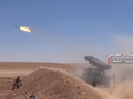 Pháo binh quân đội Syria tấn công IS trên vùng sa mạc tỉnh Homs - Ảnh truyền thông quân đội Syria