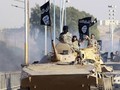 Xe thiết giáp của IS tiến công vào chiến tuyến của quân đội Syria - ảnh minh hỏa Masdar News