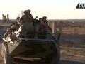 Xe thiết giáp BTR - 80 và binh sĩ đặc nhiệm Nga trên chiến trường Deir Ezzor