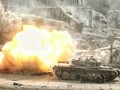 Xe tăng quân đội Syria nã đạn vào chiến tuyến của phiến quân ở Ayn - Tarma - ảnh truyền thông quân đội Syria