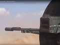 Quân đội Syria đánh trả cuộc tấn công của IS trên chiến trường Mayadeen - ảnh video truyền thông Hezbollah