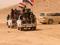 Quân đội Iraq tiến công IS trên vùng sa mạc thuộc tỉnh Anbar - ảnh Masdar News