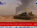 Xe tăng của lực lượng Hezbollah và xe thiết giáp quân đội Iraq trên chiến trường thành phố al-Qa'im - ảnh South Front