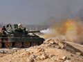 Xe tăng quân đội Syria xả đạn vào IS trên chiến trường - ảnh minh họa Masdar News
