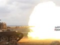 Xe tăng quân đội Syria tấn công trên chiến trường Idlib - ảnh minh họa Masdar News