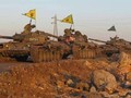 Đoàn xe tăng của lực lượng YPG tiến về Afrin. Ảnh minh họa Masdar News