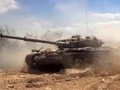 Xe tăng quân đội Syria tiến công trên chiến trường Douma- ảnh minh họa Masdar News