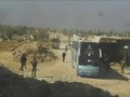 Đoàn xe buýt di tản lực lượng Hồi giáo cực đoàn về phía bắc Syria. Ảnh minh họa video Ruptly