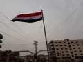 Quân đội Syria thượng cờ chủ quyền trên các thị trấn phía nam Damascus. Ảnh minh họa video SANA
