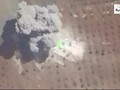 Không quân Syria phá huy pháo binh FSA ở Idlib. Ảnh minh họa video Rusvesna
