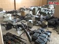Các tay súng nổi dậy FSA giao nộp vũ khí ở Rastan. Ảnh minh họa South Front