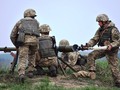 Binh sĩ Ukraina pháo kích vào khu dân cư Zaitsevo. Ảnh minh họa RIAFAN