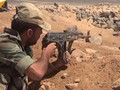 Binh sĩ quân đội Syria chiến đấu ở Al-Safa, Sweida. Ảnh minh họa video Sputnik