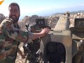 Quân đội Syria pháo kích trên chiến trường Latakia. Ảnh minh họa video Sputnik