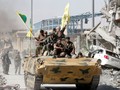 Lực lượng SDF tiến vào một khu dân cư ở Deir Ezzor. Ảnh minh họa South Front