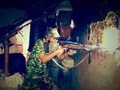 Binh sĩ quân đội Syria đánh trả cuộc tấn công của lực lượng khủng bố trên vùng nông thôn miền Tây Hama. Ảnh minh họa: Masdar News.