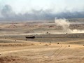 Xe thiết giáp quân đội Syria tiến công trên chiến trường al-Safa. Ảnh minh họa: South Front.