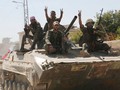 Binh sĩ quân đội Syria trên chiến trường Idlib - Hama. Ảnh minh họa Masdar News