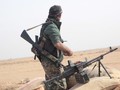 Chiến binh người Kurd trên chiến trường Afrin, tây bắc Aleppo. Ảnh minh họa: Masdar News.