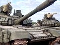 Các xe tăng T-72B1 "Đại bàng Trắng" Nga tham gia diễn tập cho cuộc diễu binh trong lễ kỷ niệm 70 năm thành lập Quân đội Nhân dân Lào.