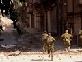 Binh sĩ quân đội Syria, tấn công trên chiến trường ngoại ô Damascus. Ảnh minh họa: Masdar News.