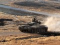 Xe tăng quân đội Syria trên chiến trường miền bắc Hama. Ảnh minh họa: Masdar News.