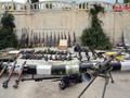 Quân đội Syria thu vũ khí trang bị cất giấu bí mật của lực lượng Hồi giáo cực đoan ở SANA. Ảnh SANA