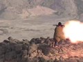 Chiến binh Houthi, sử dụng súng phóng lựu chống tăng tấn công Liên minh quân sự Ả rập Xê-út.