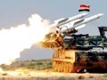 Tên lửa phòng không Syria khai hỏa đánh chặn cuộc không kích đối phương. Ảnh minh họa Masdar News