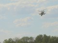 Trực thăng Ka-52 thực hiện hộ tống đơn vị đổ bộ đường không quân đội Nga. Ảnh RT