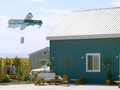 UAV giao hàng của Amazon sẽ thả gói hàng ở độ cao 3m xuống cho khách hàng. Ảnh CNBC