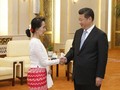 Ngày 11/6/2015, tại Bắc Kinh, Bà Aung san Suu kyi hội kiến với Chủ tịch Trung Quốc Tập Cận Bình. Ảnh: AFP.