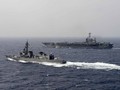 Cụm tấn công tàu sân bay USS John C. Stennis Hải quân Mỹ và Lực lượng Phòng vệ Biển Nhật Bản tiến hành diễn tập ở vùng biển Philippines ngày 23/2/2016. Ảnh: Thời báo Hoàn Cầu