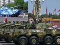 Xe bọc thép bánh lốp ZTL-11 và xe đột kích đôt bộ ZBD05 Trung Quốc trong lễ duyệt binh. Ảnh: Sina