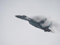 Máy bay chiến đấu Su-35 Nga bay biểu diễn tại Trung tâm Triển lãm hàng không Chu Hải Trung Quốc ngày 10/11/2014. Ảnh: Cankao