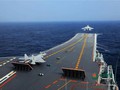 Máy bay chiến đấu J-15 Trung Quốc tập cất cánh trên tàu sân bay Liêu Ninh. Ảnh: Cankao