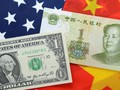 Chiến tranh tiền tệ Trung - Mỹ sẽ bùng phát? Ảnh: DW.