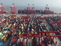 Sau khi gia nhập WTO vào năm 2001, sự thịnh vượng của thương mại đối ngoại đã đóng vai trò rất quan trọng đối với sự "cất cánh" của nền kinh tế Trung Quốc. Ảnh: Xinhuanet.