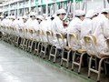 Một dây chuyền lắp ráp trong nhà máy Longhua của Foxconn tại Thâm Khuyến, Trung Quốc