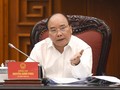 Thủ tướng Nguyễn Xuân Phúc phát biểu tại cuộc họp. Ảnh: VGP/Quang Hiếu