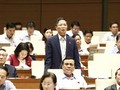 Bộ trưởng Bộ Công Thương Trần Tuấn Anh trả lời chất vấn các đại biểu Quốc hội. (Ảnh: Văn Điệp/TTXVN)