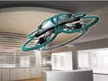 Những nhân viên làm việc quá giờ sẽ bị drone đến "hỏi thăm" (ảnh: The Verge)