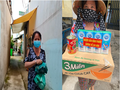 Người dân quận Bình Tân (TP Hồ Chí Minh) vui vẻ khi nhận những món quà nhỏ từ người dân Bình Phước
