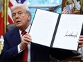 Tổng thống Trump ký sắc lệnh phê duyệt thỏa thuận chuyển nhượng TikTok. Ảnh: Reuters
