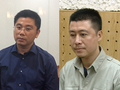 Bị can Nguyễn Văn Dương (đeo kính) và bị can Phan Sào Nam. (Ảnh: MPS)